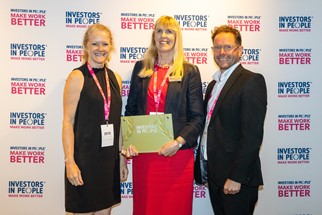 Julie Cavanagh & Fiona Garry from the SCQFP accept the IiP award plaque