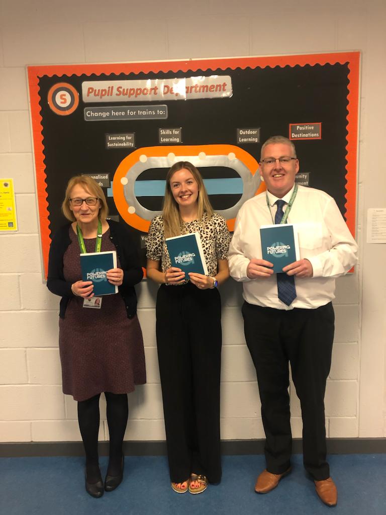 3 St Matthew's Academy teachers holding up Powering Futures booklets